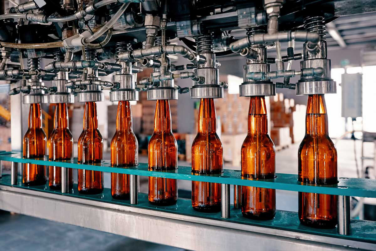 Beer bottles on an assembly line